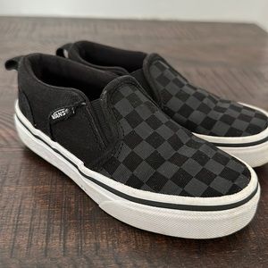 Black checker vans slip on